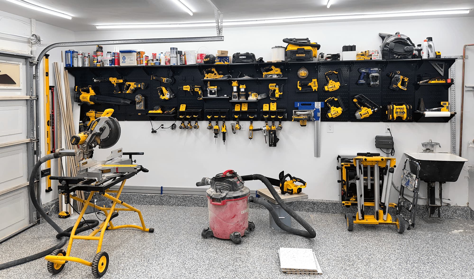 Garage showing a series of Dewalt tools carfuly organized